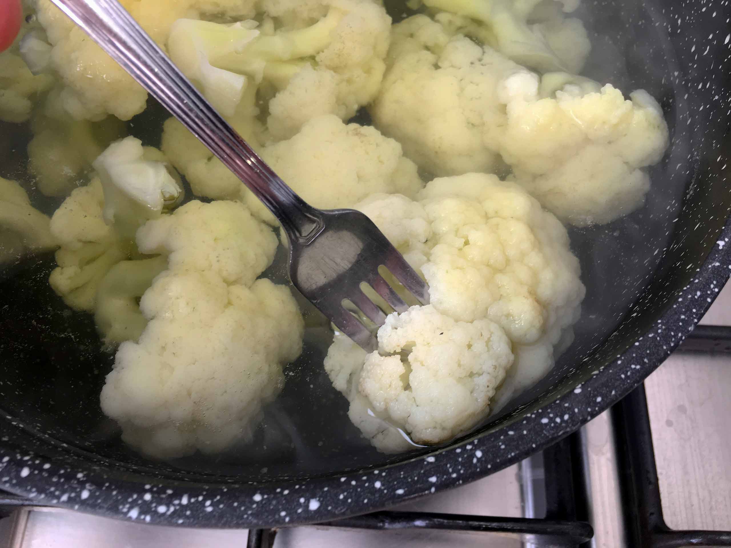 Check the cauliflower with a fork