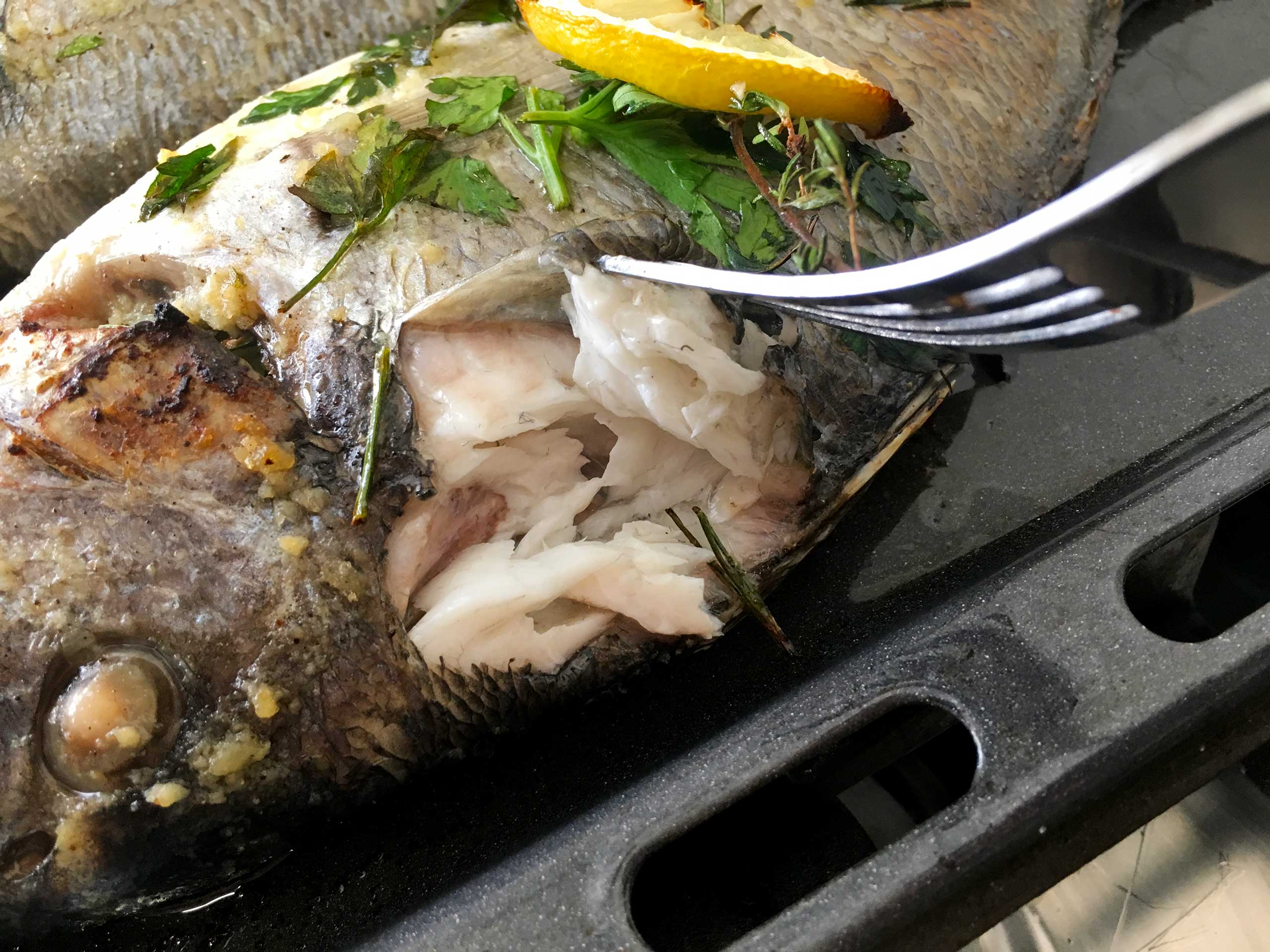 check to see if the sea bream is ready