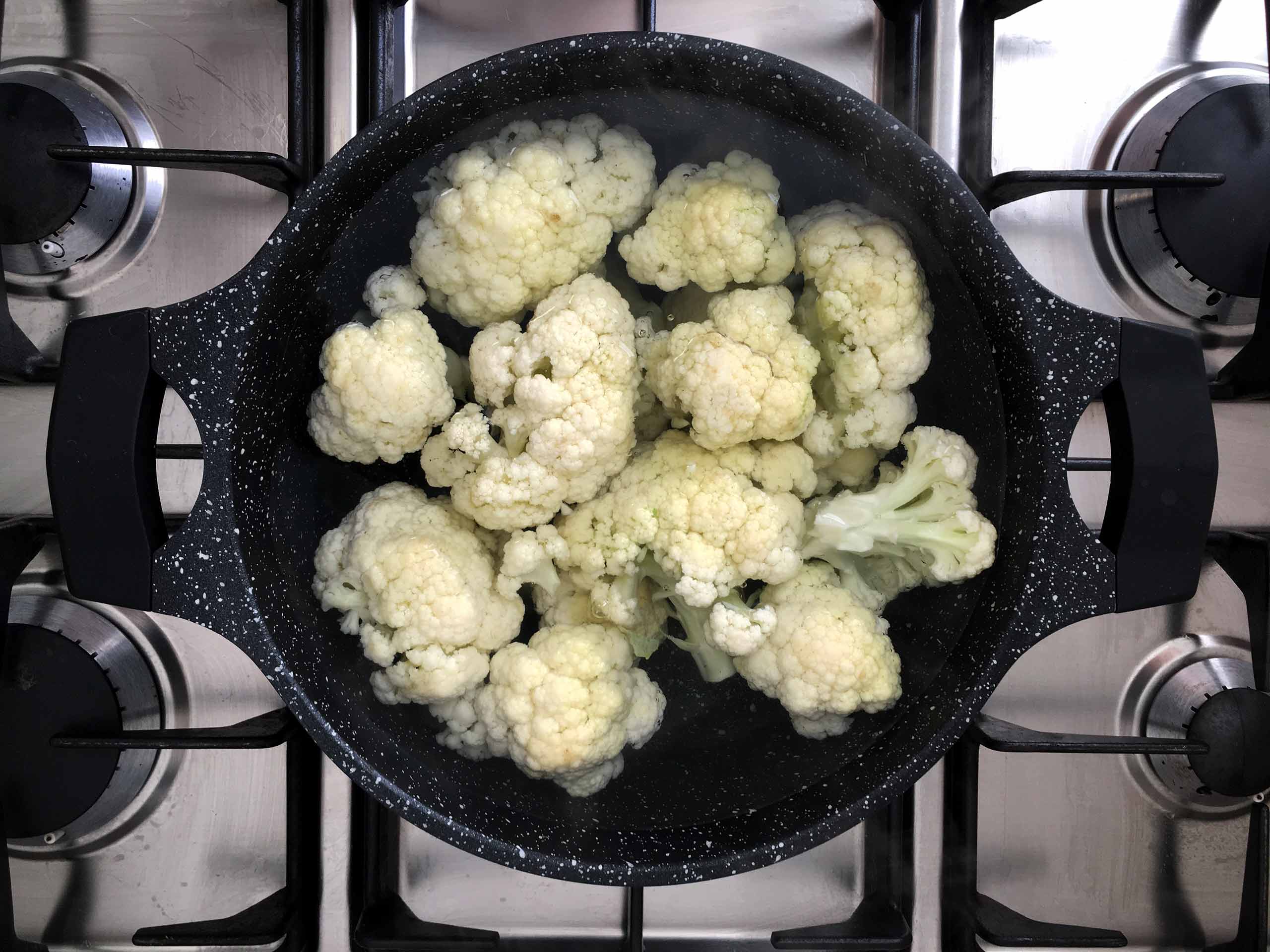 place the cauliflowers in the boiling water