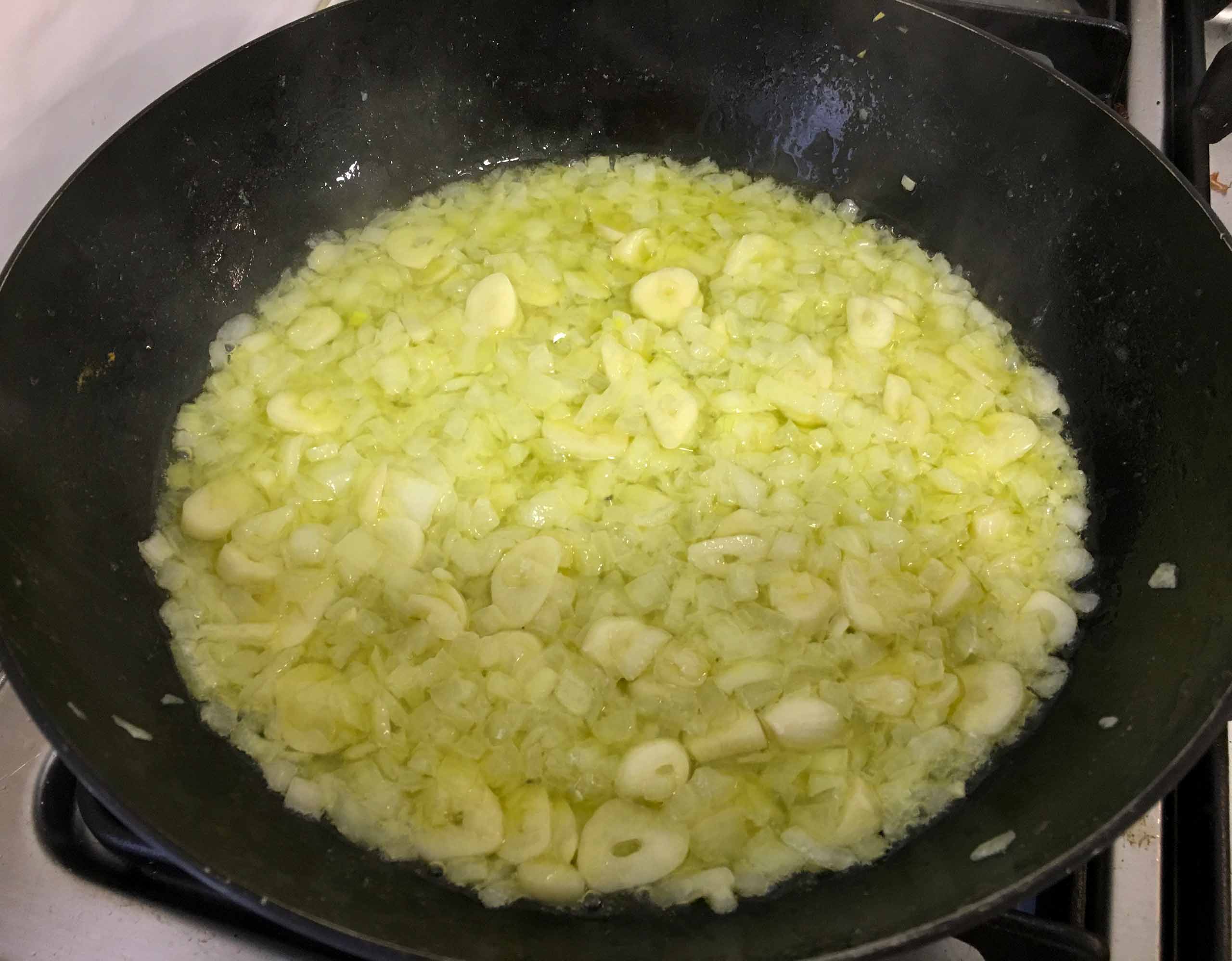 Add the shallots, garlic, and salt. caramelize the onion and garlic around 5 minutes until lightly browned.