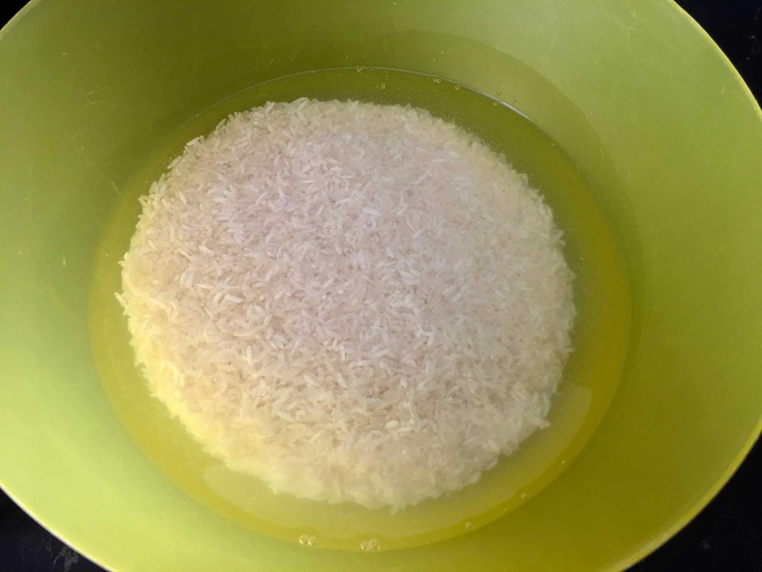 Place the rice in a bowl and cover with fresh water