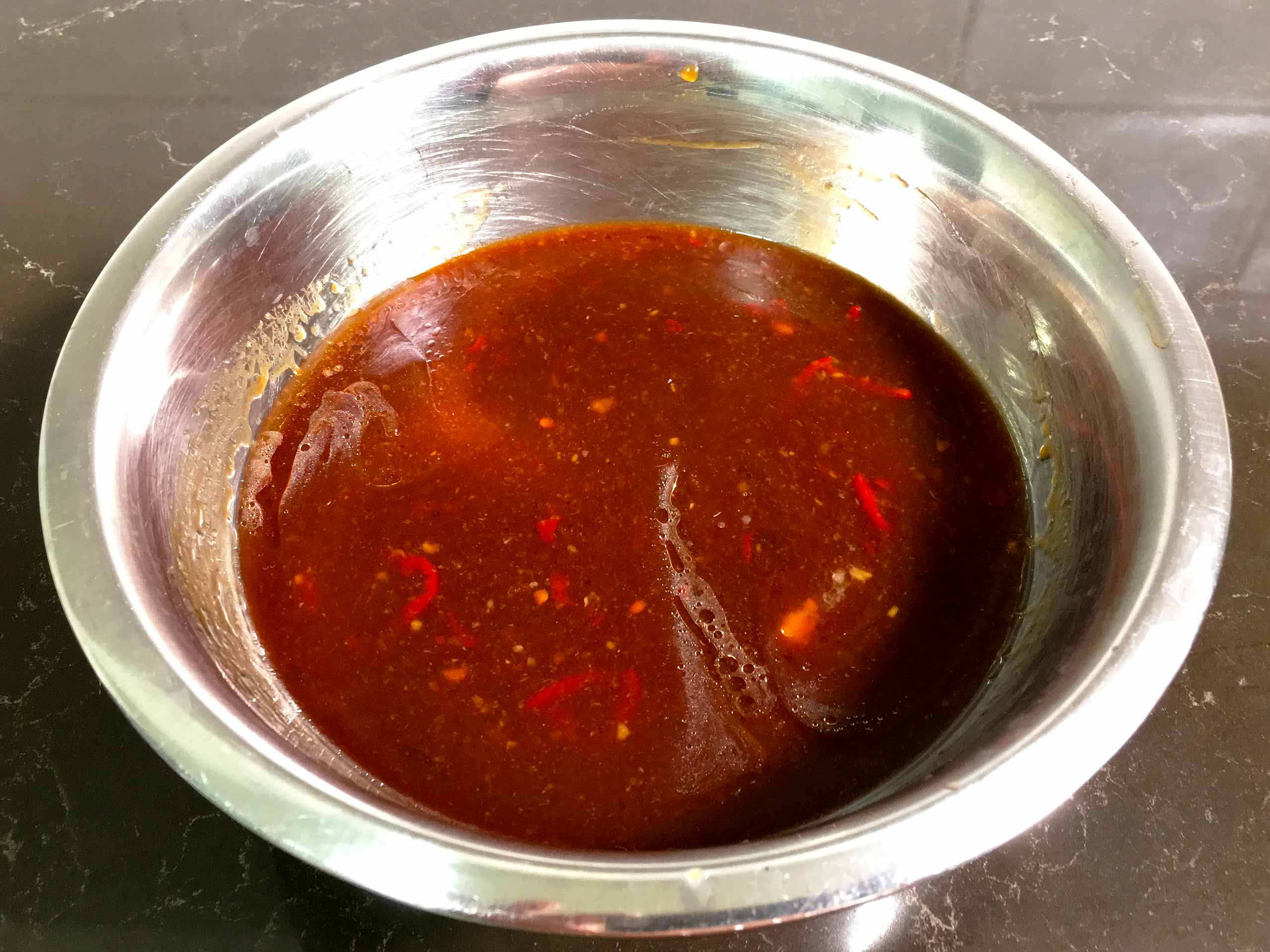 mix the ingredient for chicken in sweet chili sauce with touches of spiciness