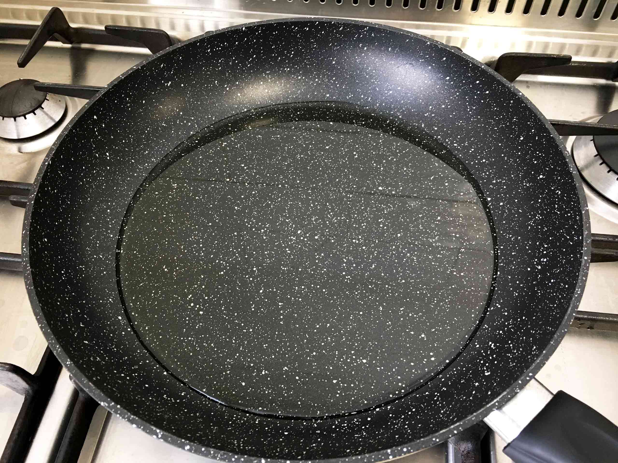 heat oil in frying pan