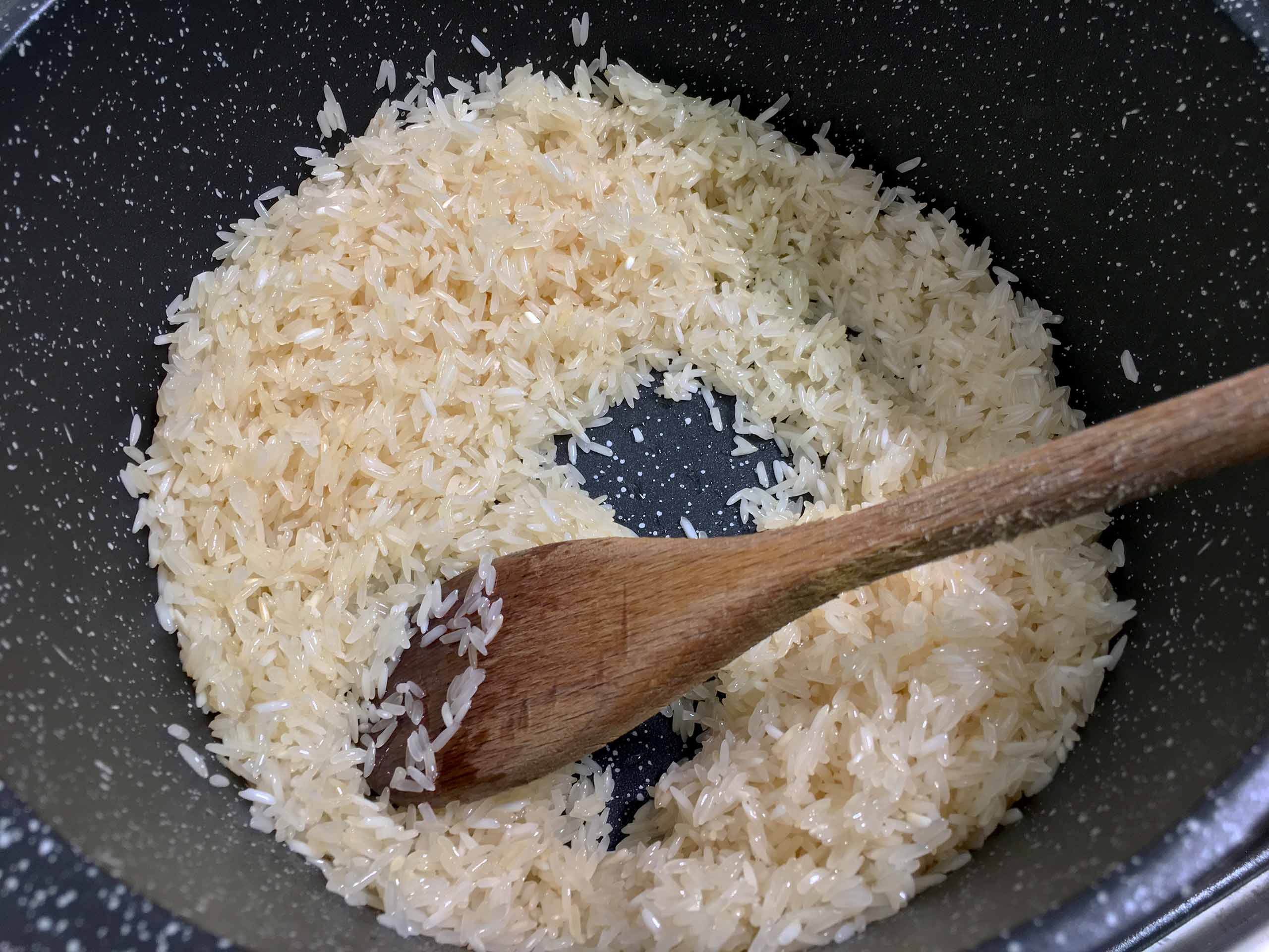 Stir fry the rice